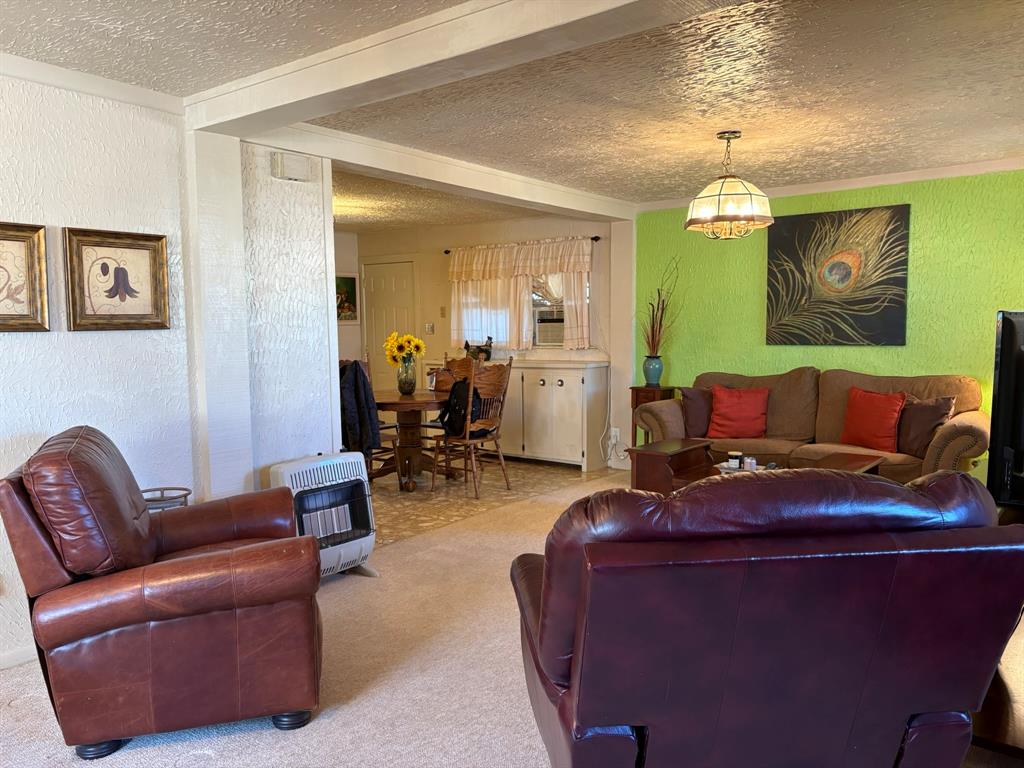 409 East Truett Street Winters, TX 79567 - Photo 4 of 21 Living is open to kitchen!