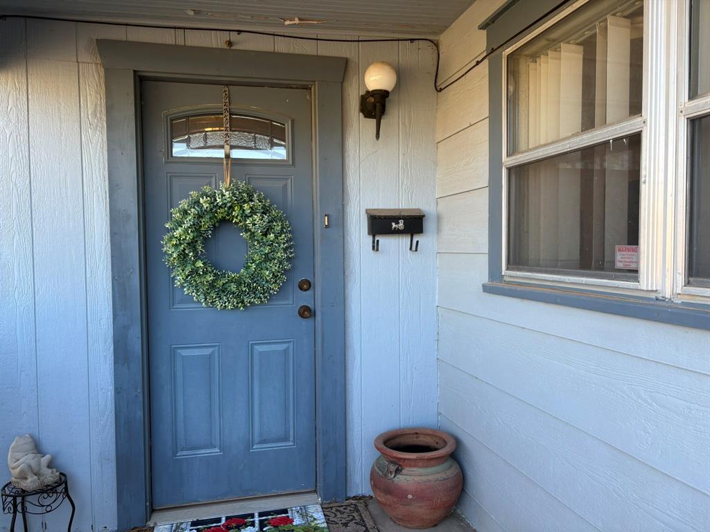 409 East Truett Street Winters, TX 79567 - Photo 7 of 21 Close up of covered front porch.