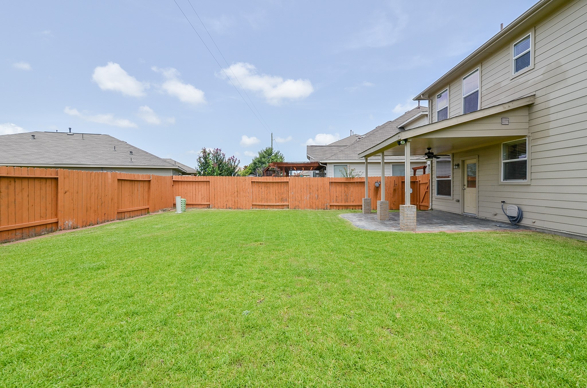 25135 Ginger Ranch Drive Katy, TX 77494 - Photo 31 of 32 This expansive yard offers excellent versatility, whether used for entertaining, recreation, or additional outdoor features.
