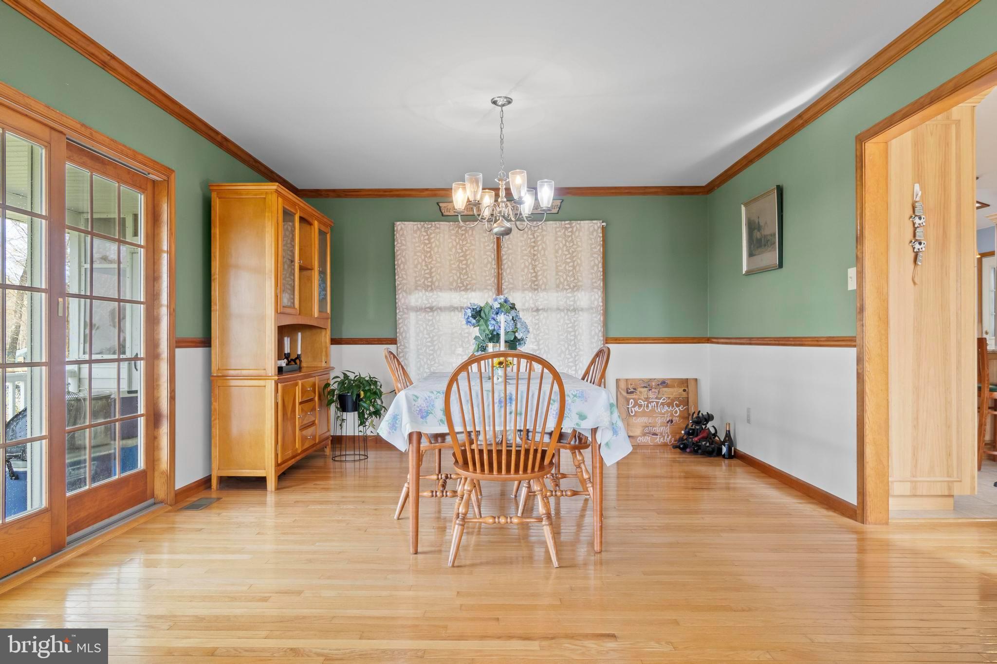 24 Oriental Road Shamong, NJ 08088 - Photo 20 of 67 a view of a livingroom with dining room and chandelier