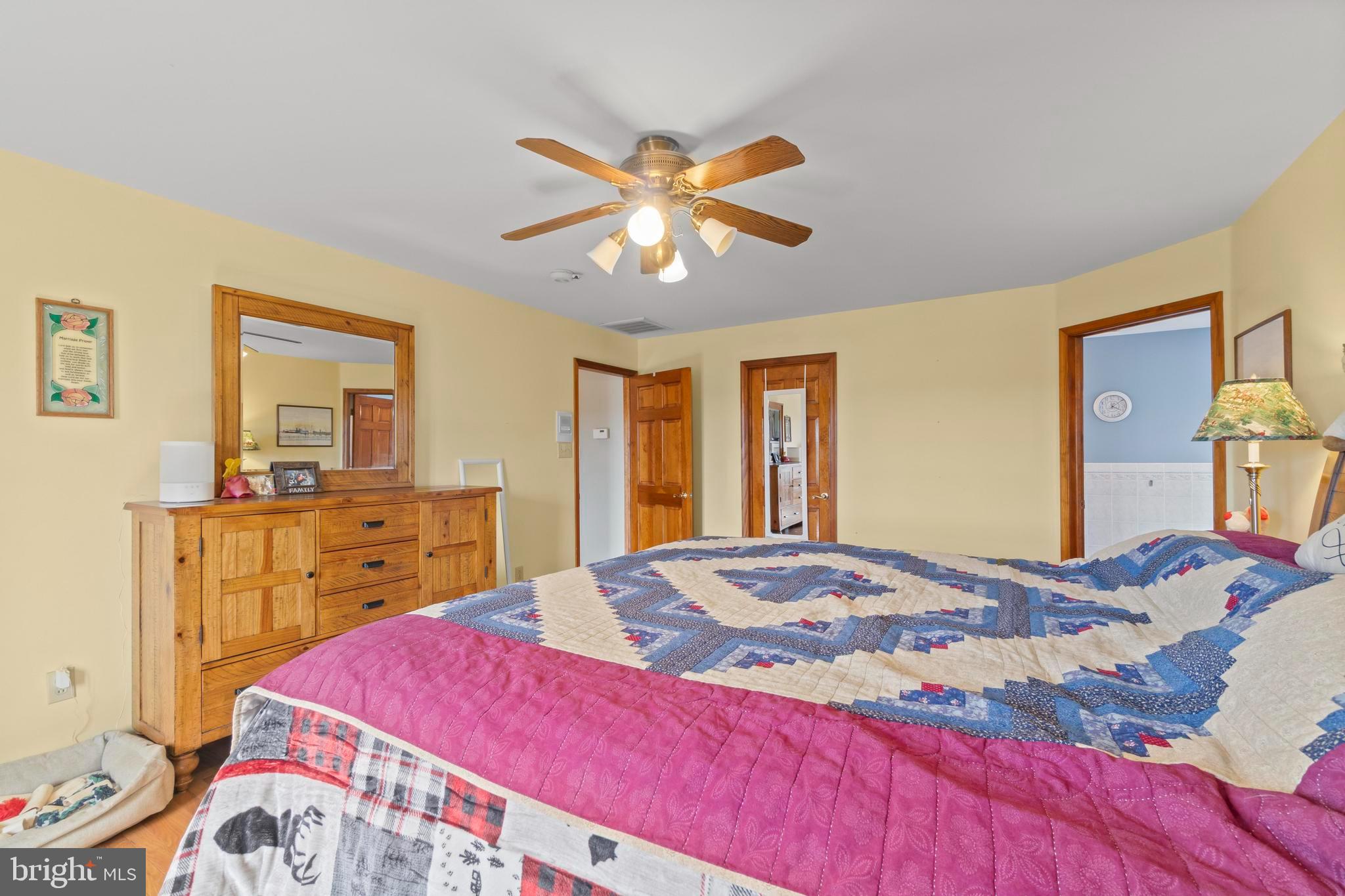 24 Oriental Road Shamong, NJ 08088 - Photo 26 of 67 a bedroom with a bed and a dresser in it