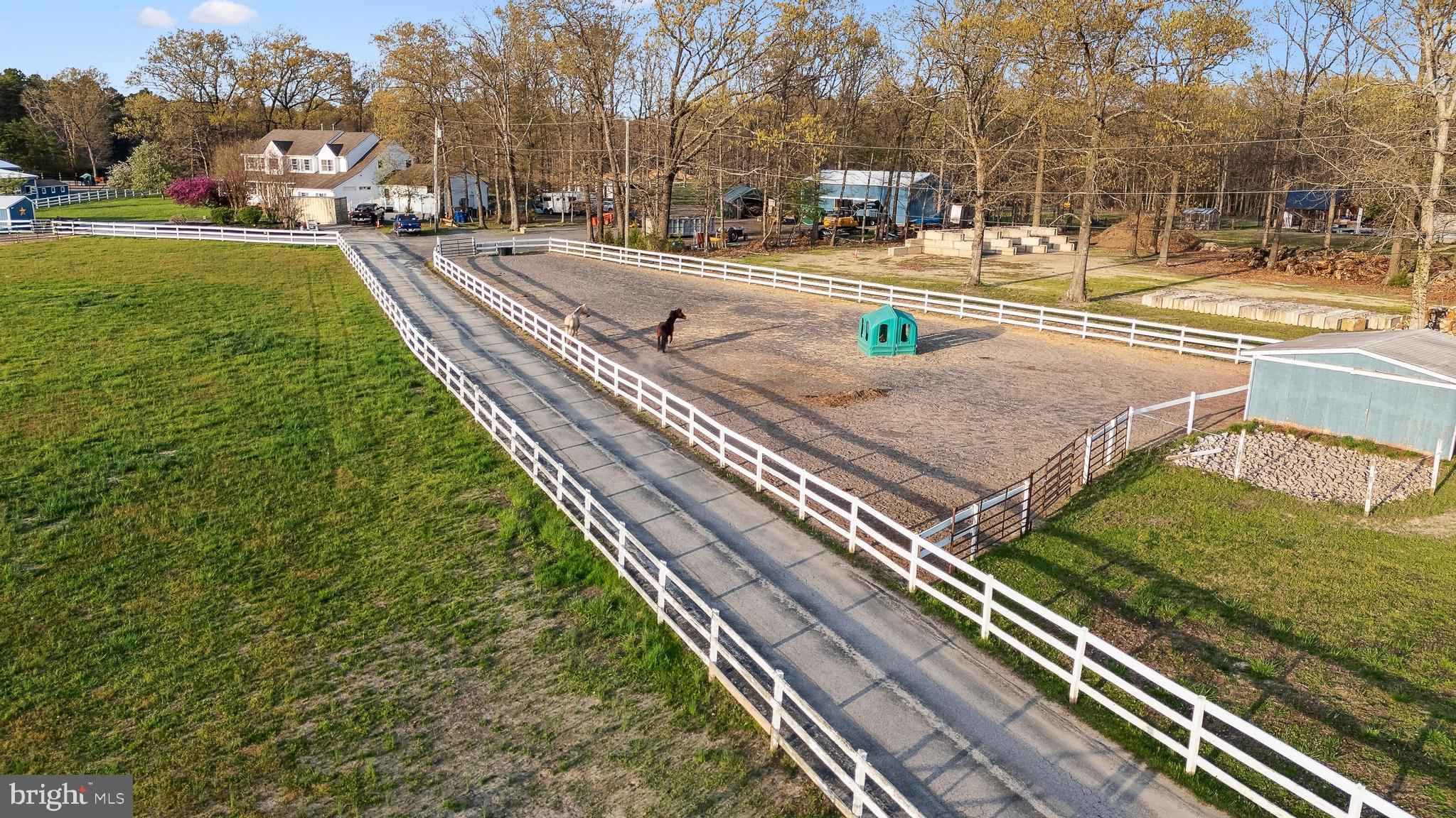 24 Oriental Road Shamong, NJ 08088 - Photo 66 of 67 a view of a yard with cars on both side of the road
