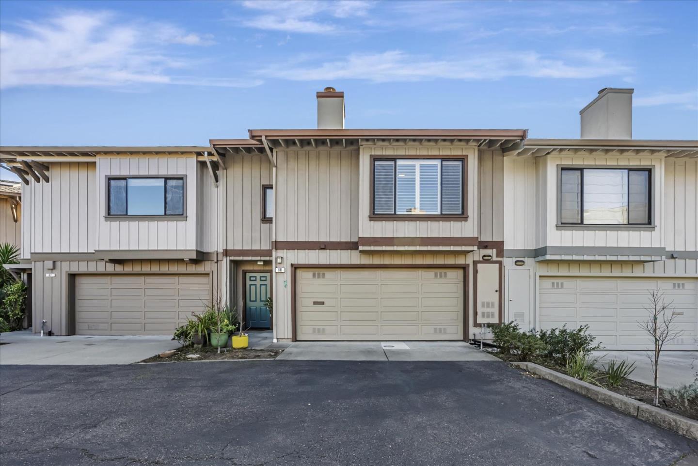 front view of a house with a street