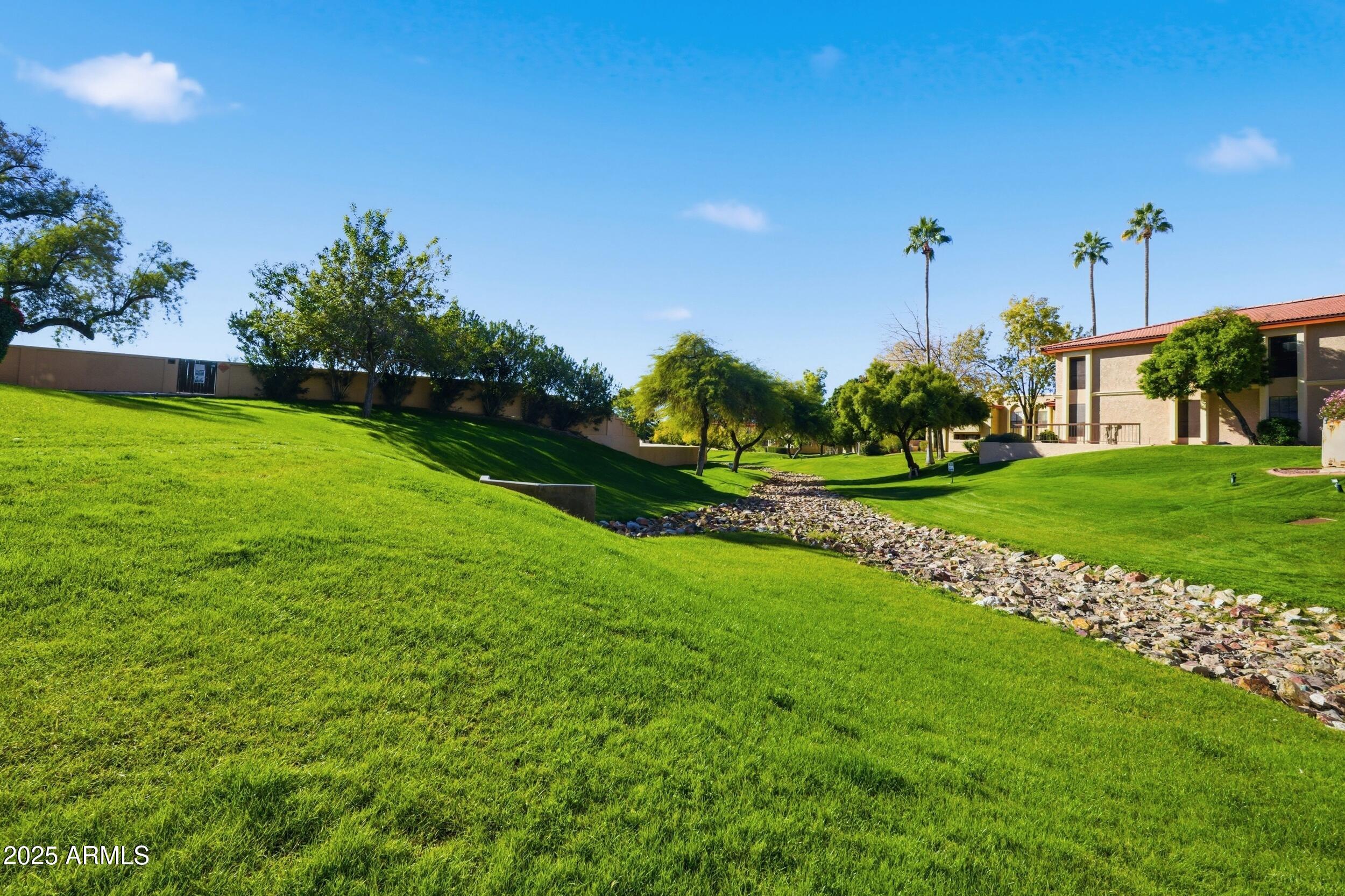 10410 North Cave Creek Road, Unit 2027 Phoenix, AZ 85020 - Photo 18 of 28 a view of a garden