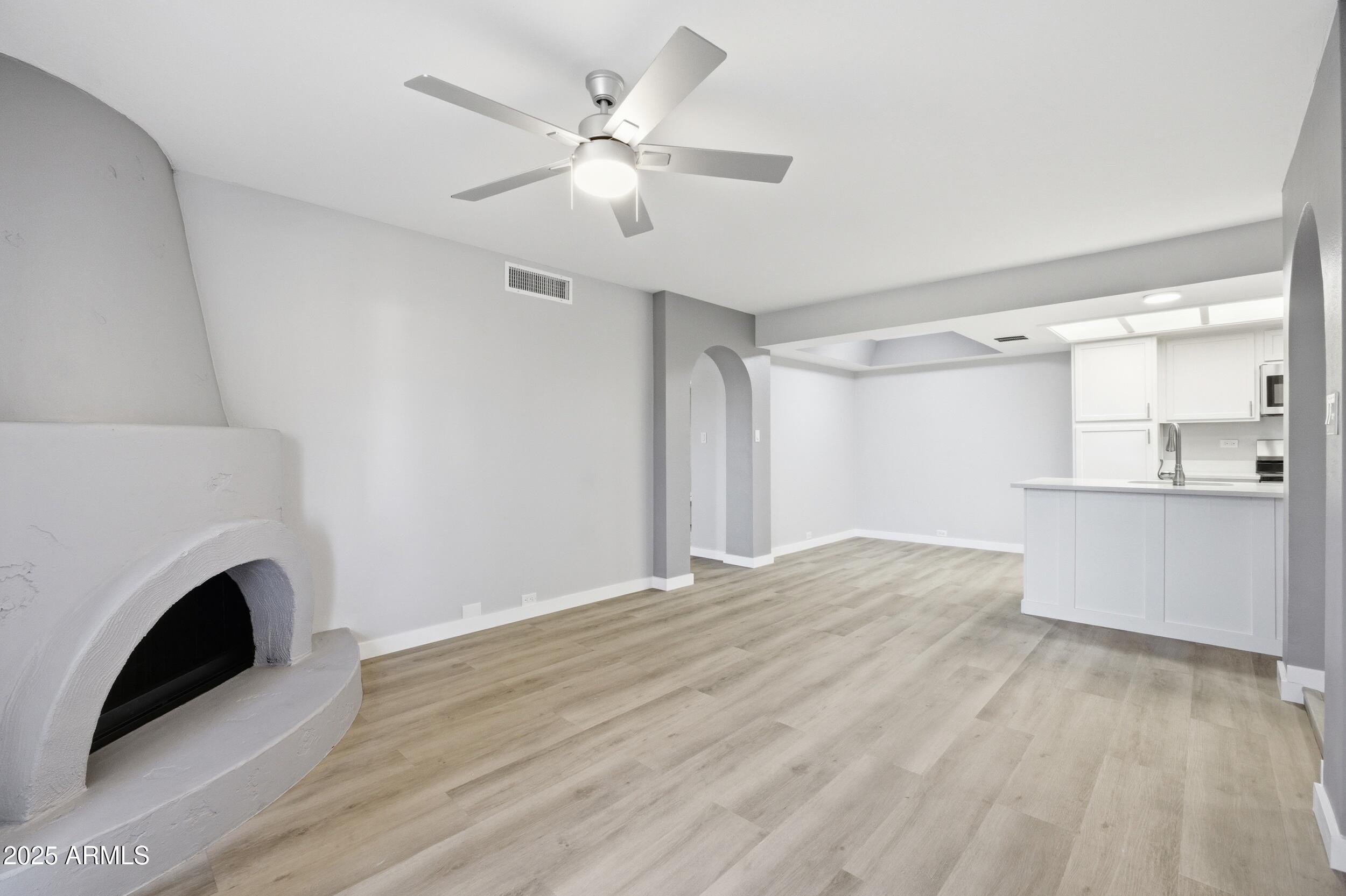 10410 North Cave Creek Road, Unit 2027 Phoenix, AZ 85020 - Photo 4 of 28 a view of empty room with washer and dryer