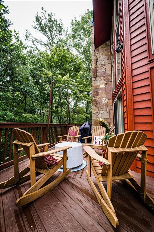 15 Alm Strasse Helen, GA 30545 - Photo 11 of 71 a view of a roof deck with couches and wooden floor