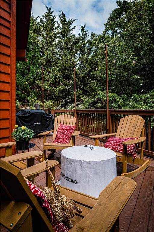 15 Alm Strasse Helen, GA 30545 - Photo 14 of 71 an outdoor sitting area with furniture and wooden floor