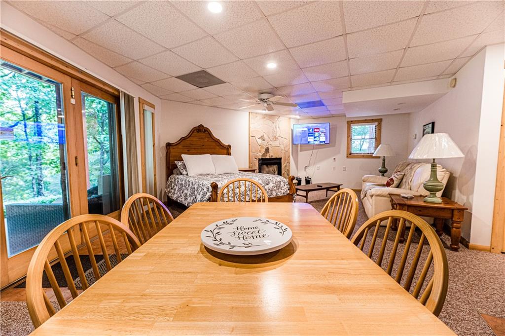 15 Alm Strasse Helen, GA 30545 - Photo 28 of 71 a bedroom with furniture and a large window