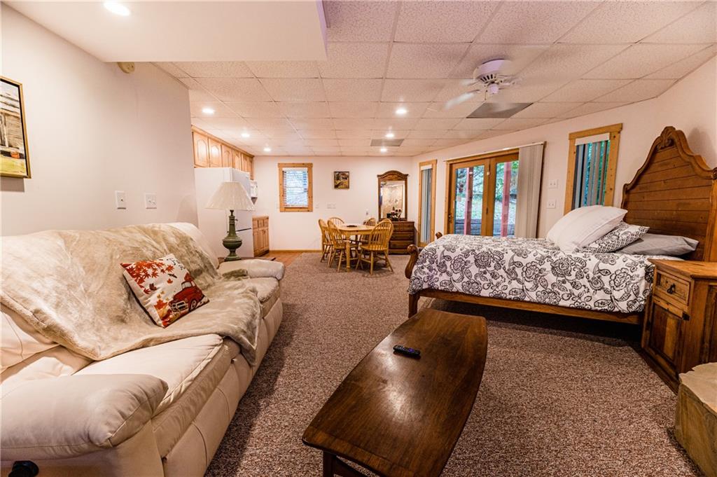 15 Alm Strasse Helen, GA 30545 - Photo 33 of 71 a bedroom with furniture and a large window