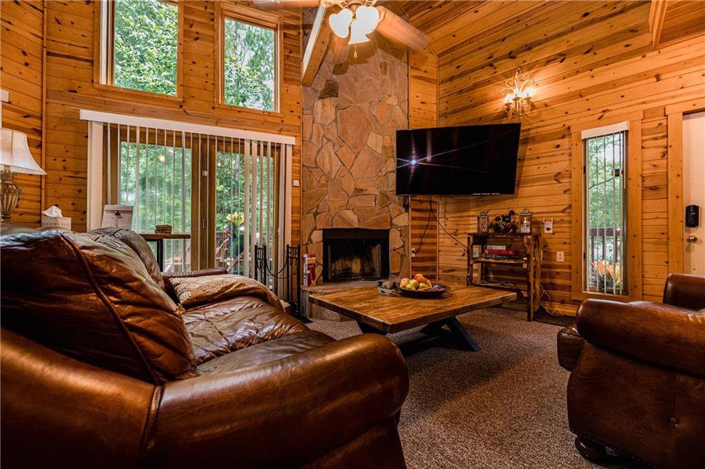 15 Alm Strasse Helen, GA 30545 - Photo 41 of 71 a outdoor living space with patio furniture and a fireplace