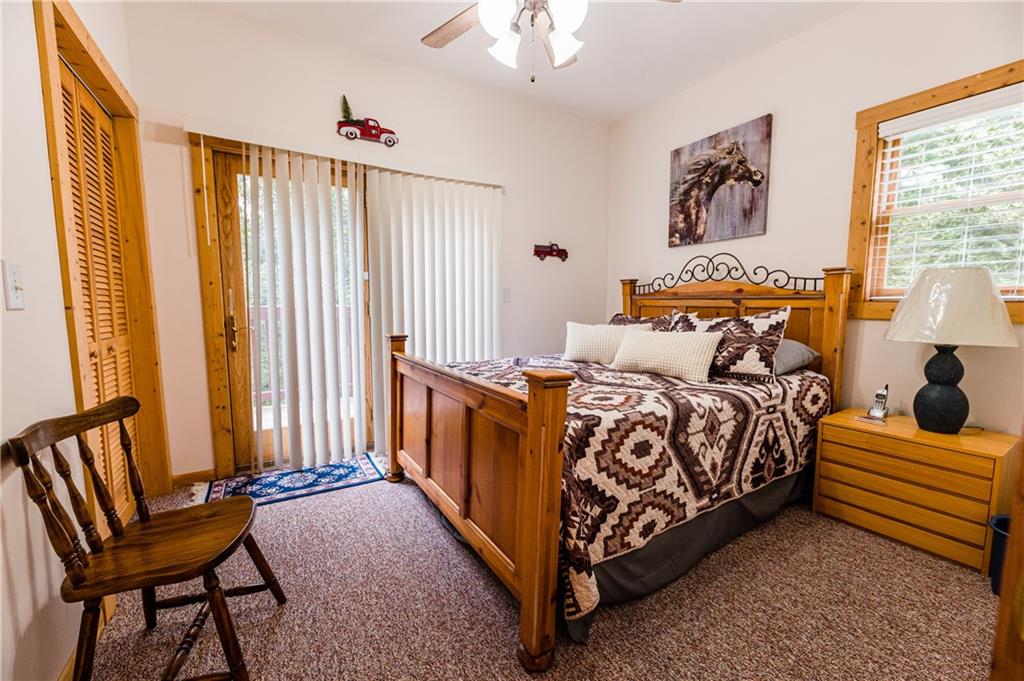 15 Alm Strasse Helen, GA 30545 - Photo 46 of 71 a bedroom with a bed and a window
