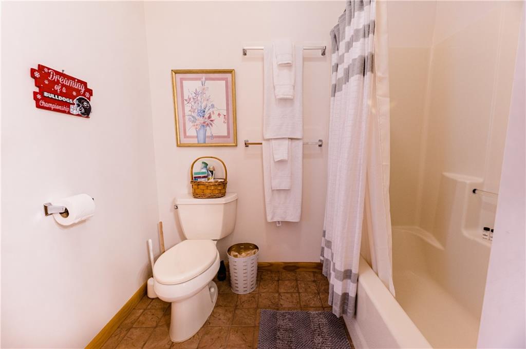 15 Alm Strasse Helen, GA 30545 - Photo 54 of 71 a white toilet sitting next to a bathroom sink