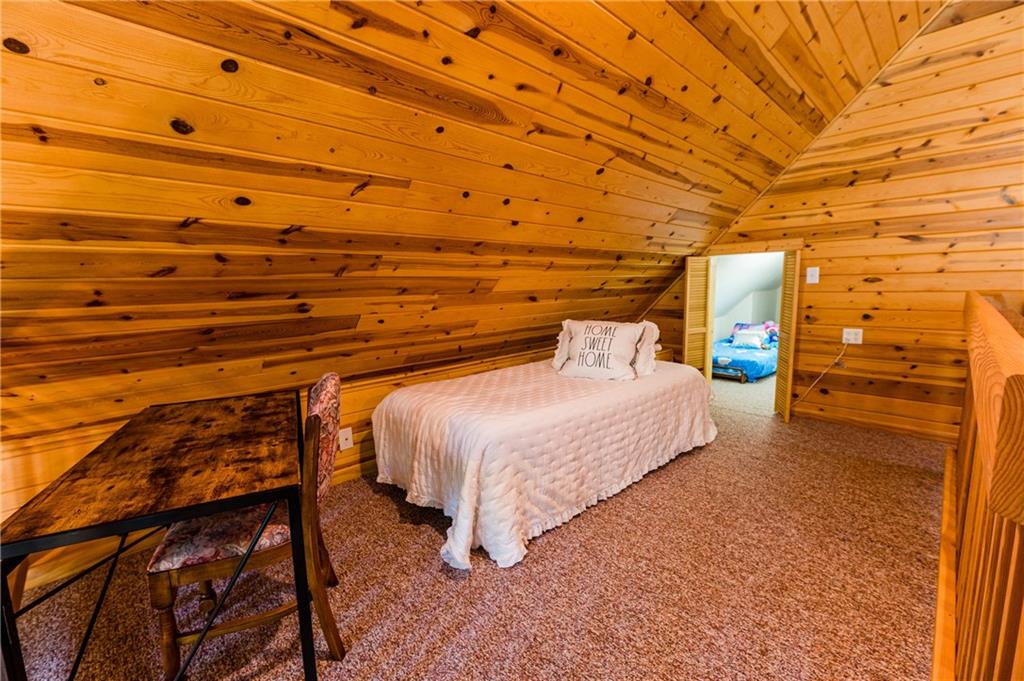 15 Alm Strasse Helen, GA 30545 - Photo 55 of 71 a bed room with a bed and a closet