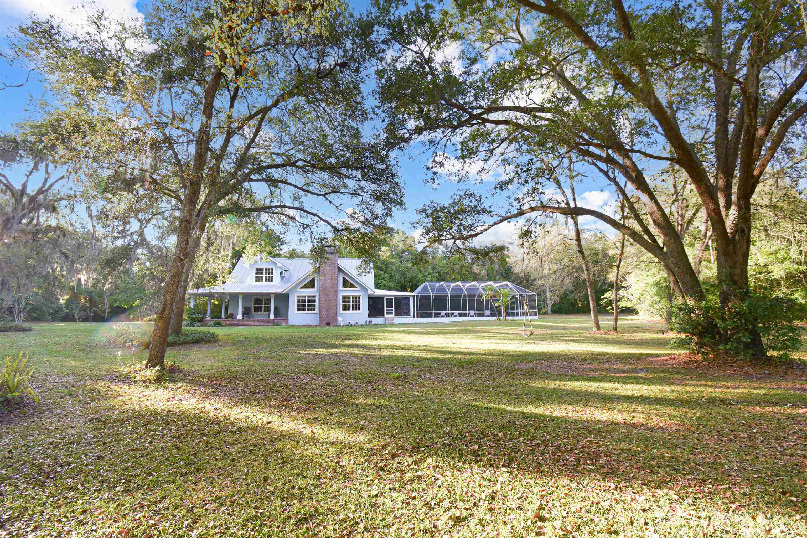 127 Kent Estate Road Elkton, FL 32033 - Photo 54 of 69 a front view of a house with a yard