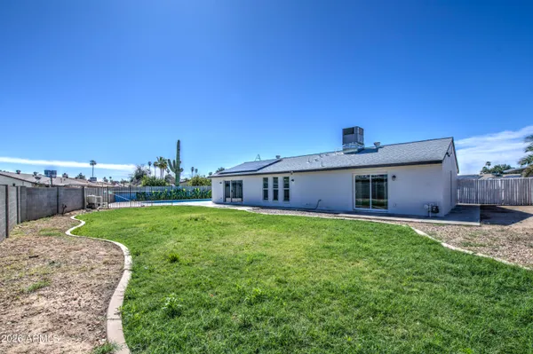 a house view with a garden space