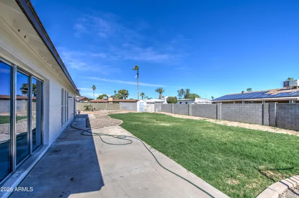 a view of a backyard with garden