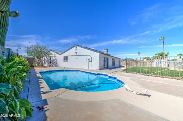 a view of outdoor space yard and swimming pool