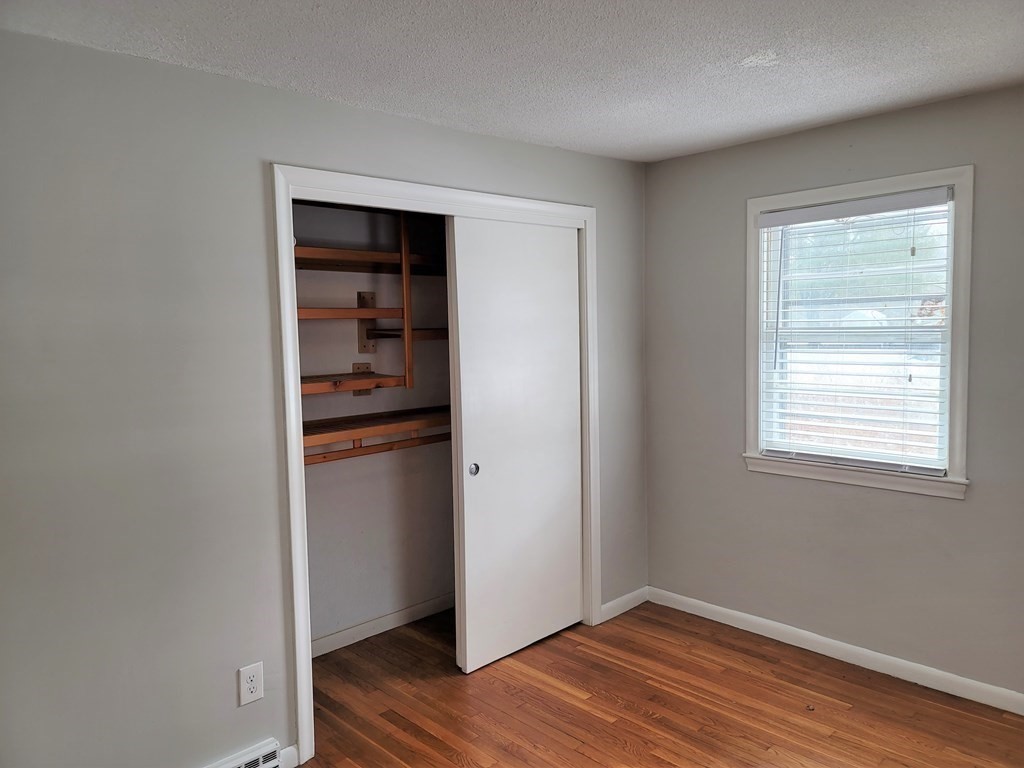 4 Allen Road Billerica, MA 01821 - Photo 12 of 24 a view of an empty room with closet and a window