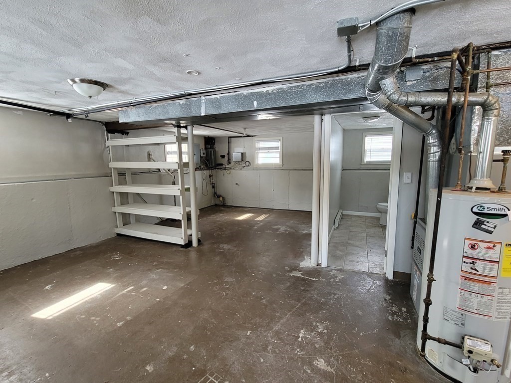 4 Allen Road Billerica, MA 01821 - Photo 14 of 24 a view of a room with racks on the wall