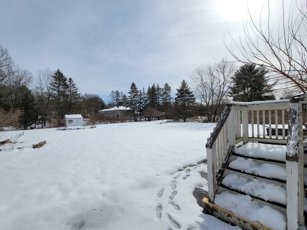 4 Allen Road Billerica, MA 01821 - Photo 17 of 24 a view of roof deck with chairs and wooden fence
