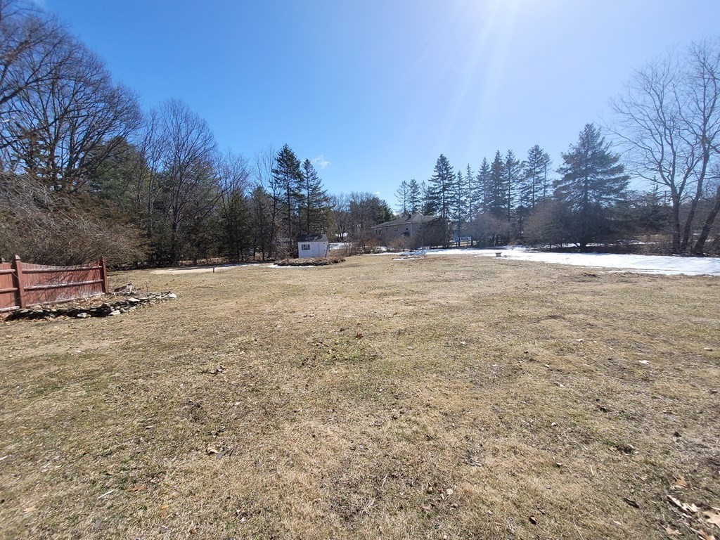 4 Allen Road Billerica, MA 01821 - Photo 19 of 24 a view of empty field with trees in the background