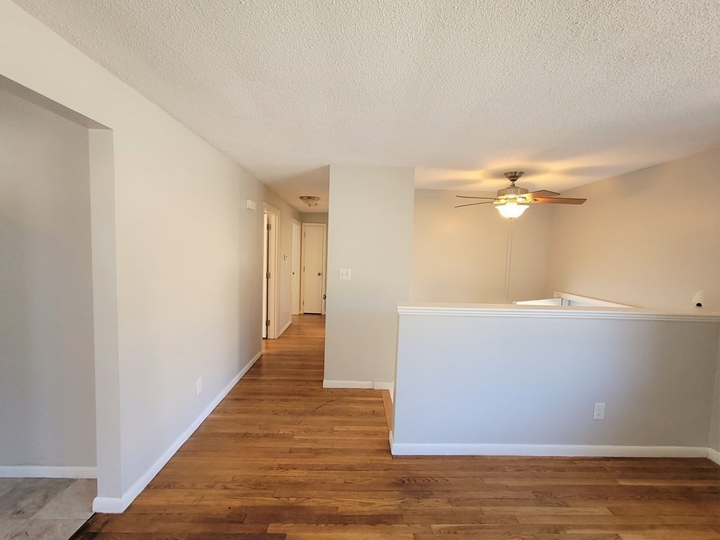 4 Allen Road Billerica, MA 01821 - Photo 6 of 24 a view of an empty room with wooden floor