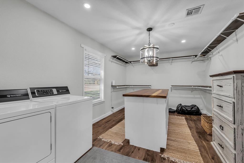 1835 Ft Graham Road Waco, TX 76705 - Photo 21 of 40 a kitchen with kitchen island a counter top space appliances and cabinets