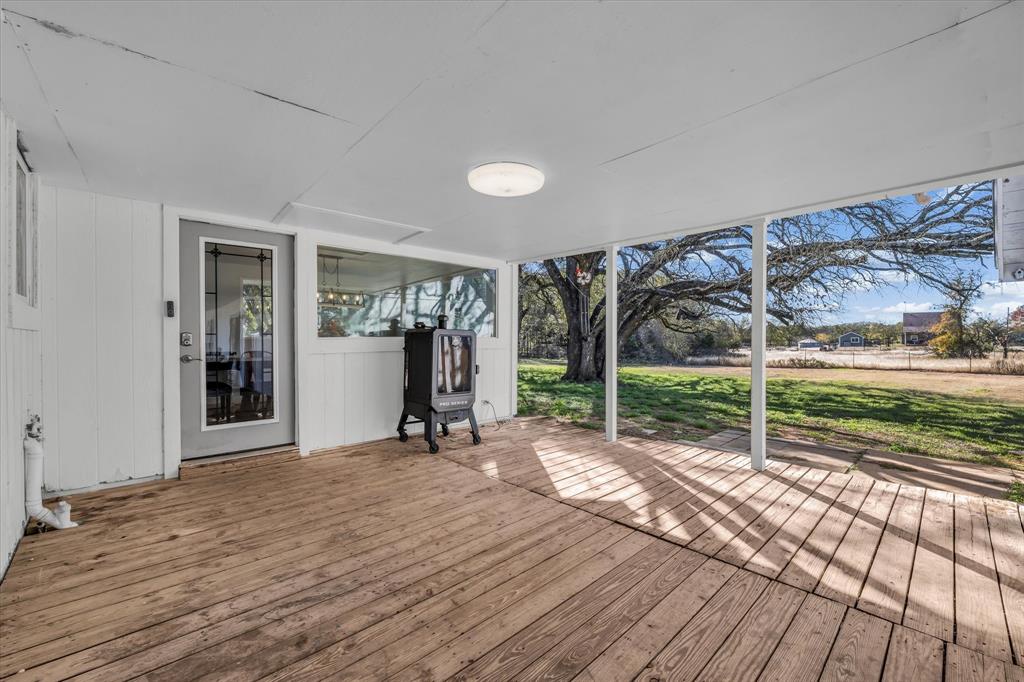 1835 Ft Graham Road Waco, TX 76705 - Photo 33 of 40 a view of a room with wooden floor and fence