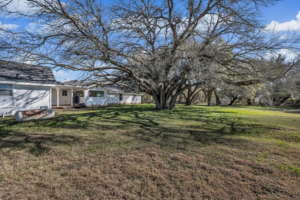 1835 Ft Graham Road Waco, TX 76705 - Photo 5 of 40 a view of a house with a yard
