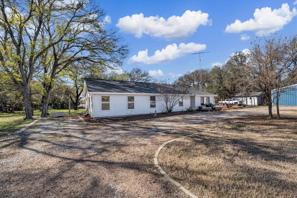 1835 Ft Graham Road Waco, TX 76705 - Photo 7 of 40 a view of a house with a yard