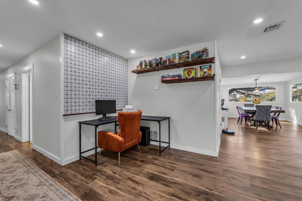 1835 Ft Graham Road Waco, TX 76705 - Photo 10 of 40 a workspace with furniture and wooden floor