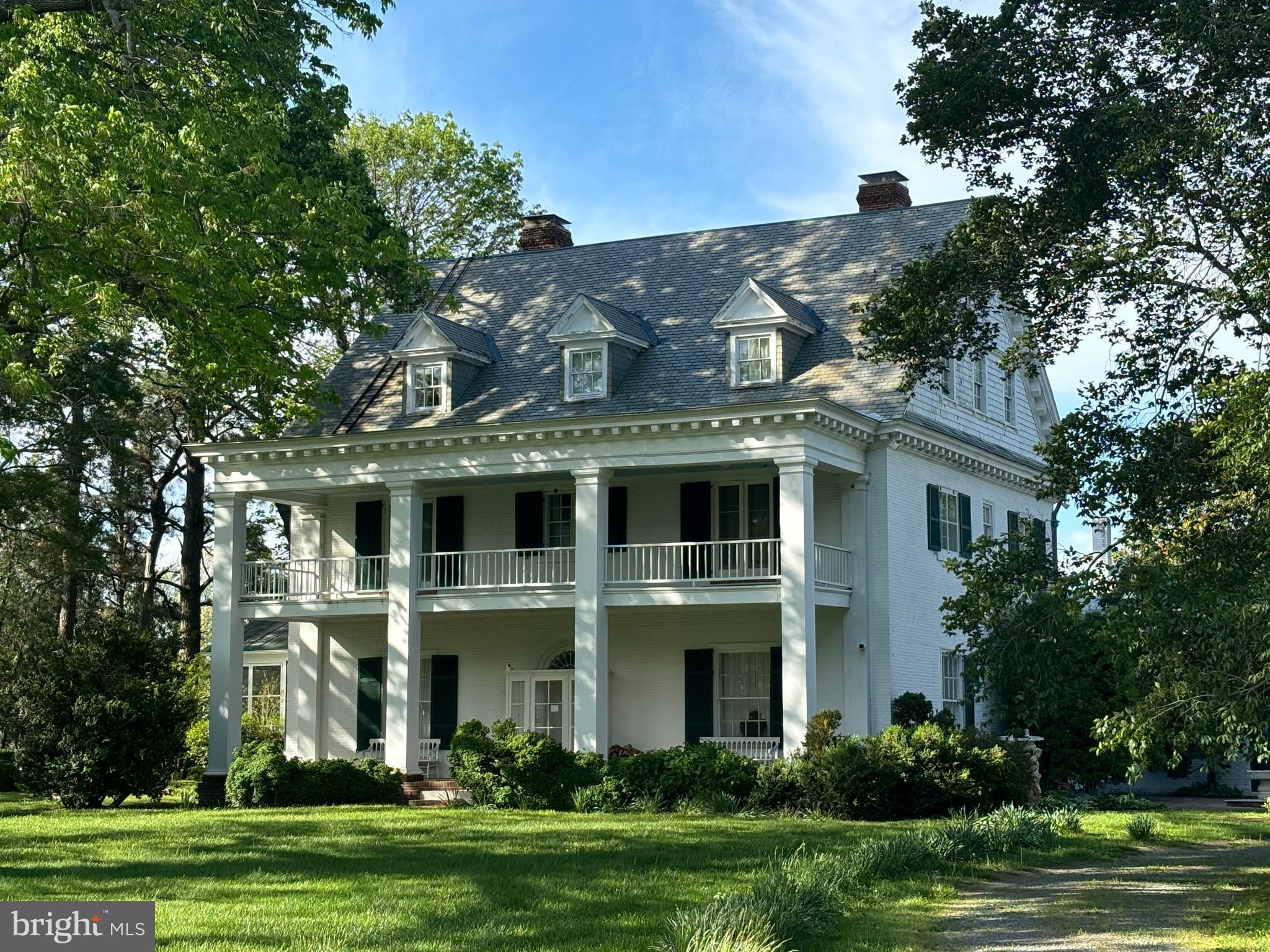 Main residence surrounded by Spring foliage