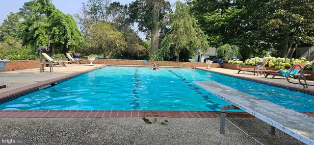 a view of a golf course with a lake