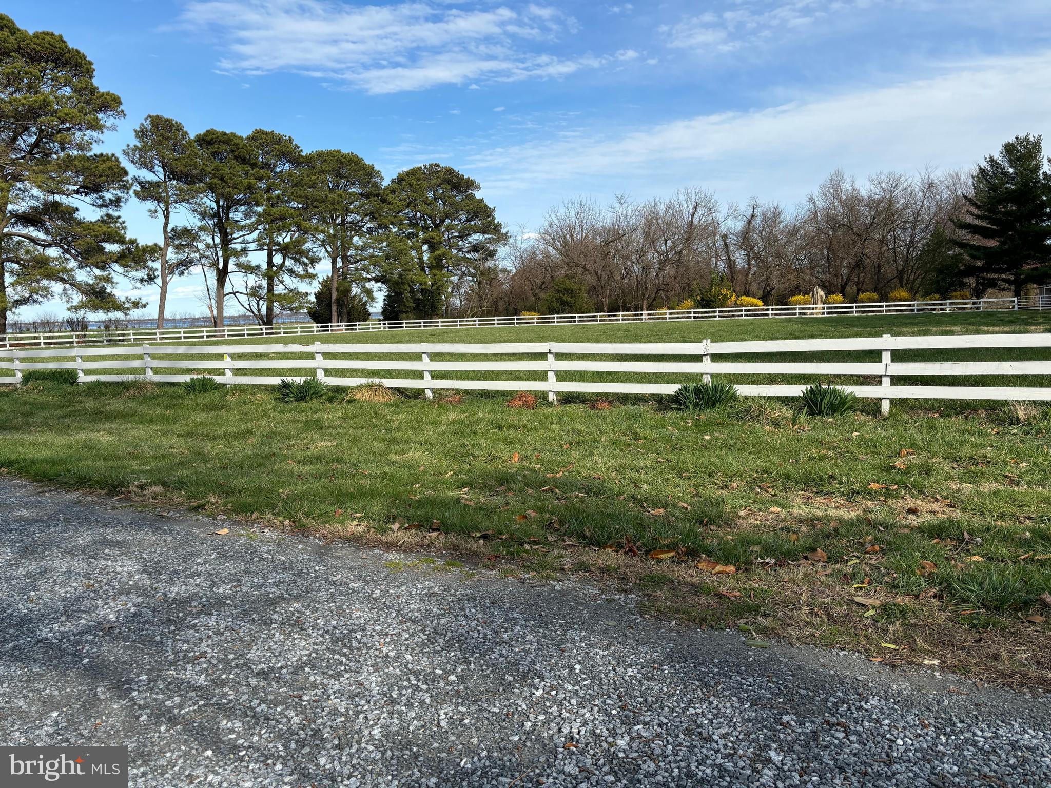 10770 Rich Neck Road Claiborne, MD 21624 - Photo 38 of 107 a view of a golf course with a lake