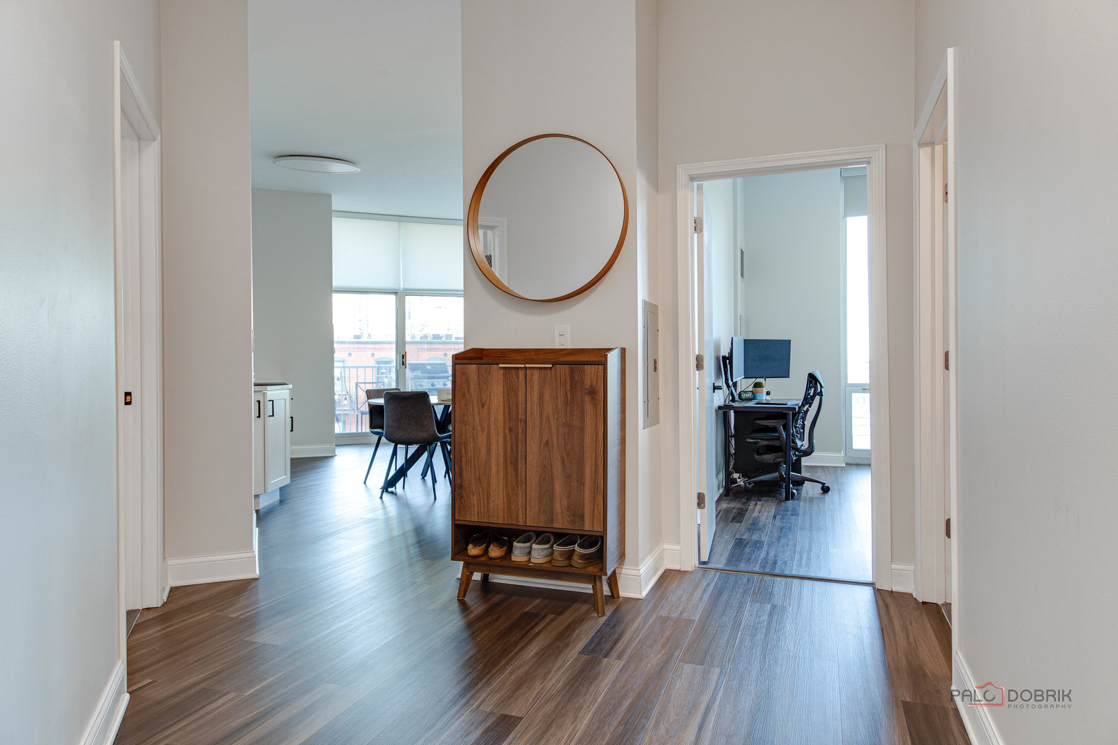 1600 South Indiana Avenue, Unit 803 Chicago, IL 60616 - Photo 6 of 24 a view of a livingroom with furniture and a mirror