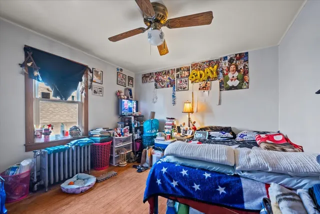a living room with furniture a rug and a chandelier
