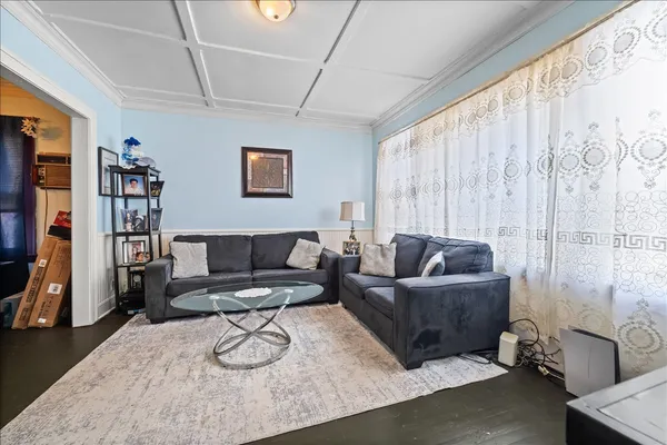 a living room with furniture and a couch