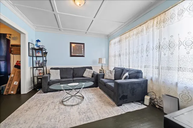 a living room with furniture and a couch