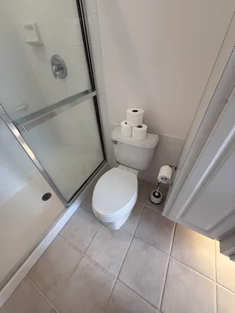 a bathroom with a double vanity sink and mirror