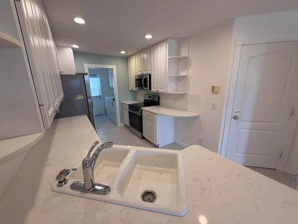 a utility room with a sink