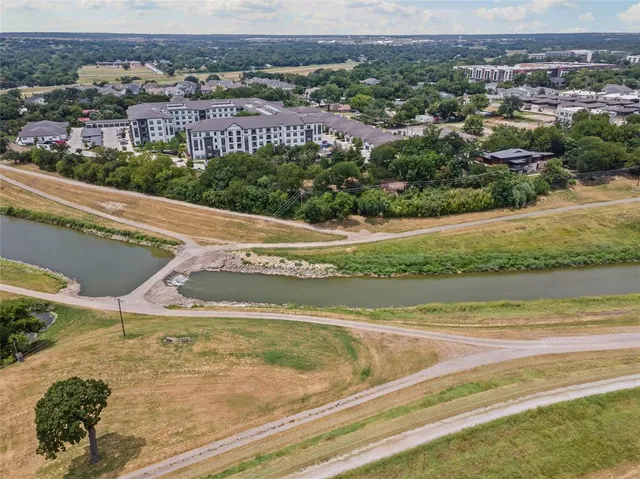 a view of a lake with a city