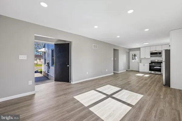 a view of livingroom with furniture and wooden floor