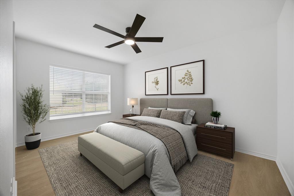 709 Sherman Street Rockwall, TX 75087 - Photo 11 of 23 a bedroom with a large bed and a window