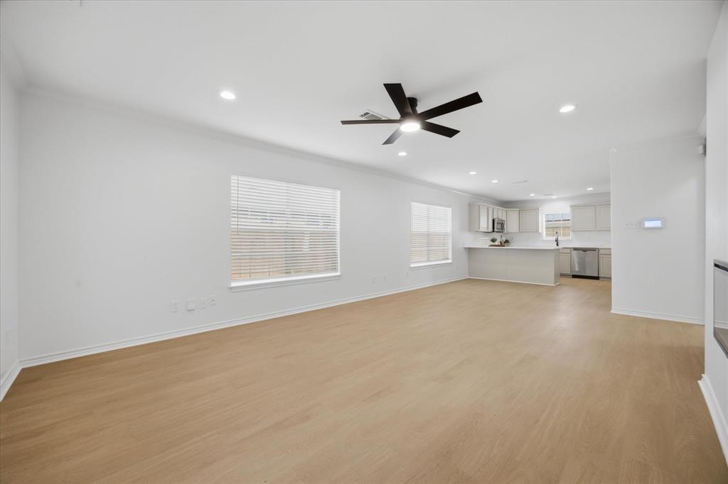 709 Sherman Street Rockwall, TX 75087 - Photo 19 of 23 a view of a kitchen with a sink and cabinet area