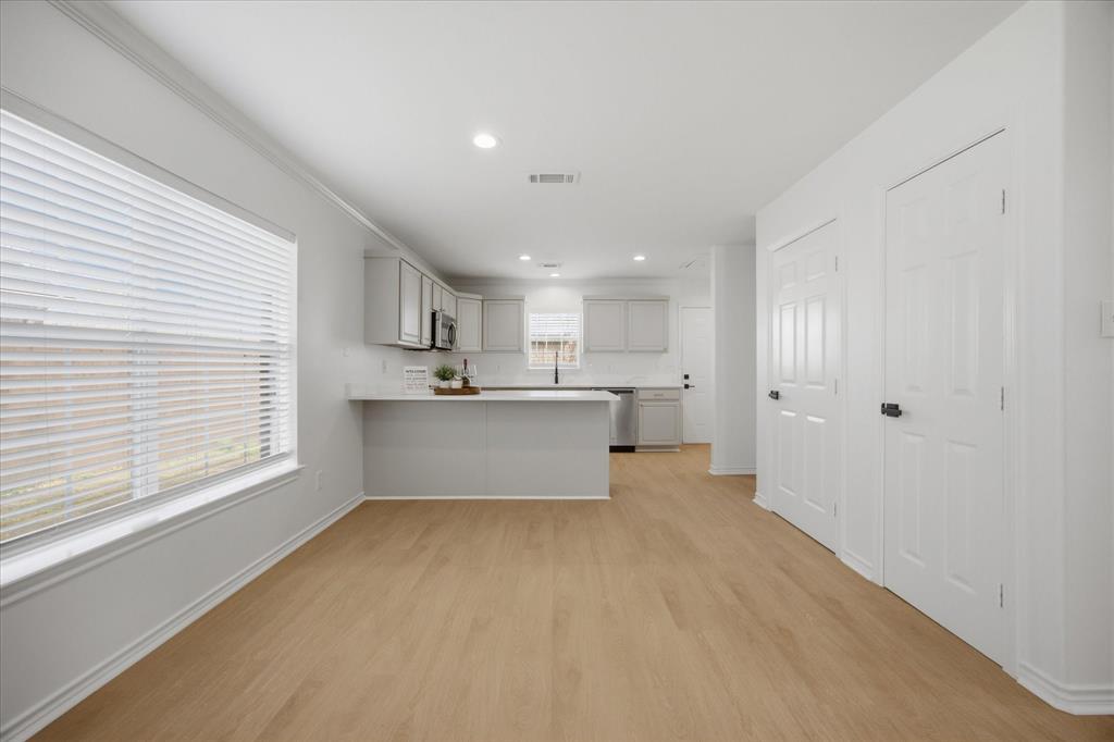 709 Sherman Street Rockwall, TX 75087 - Photo 20 of 23 a view of kitchen with wooden floor