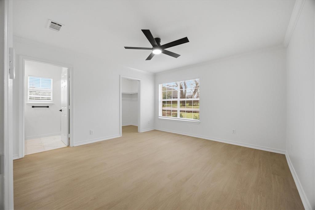 709 Sherman Street Rockwall, TX 75087 - Photo 21 of 23 a view of an empty room with a window