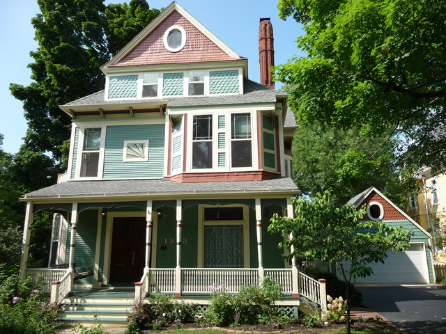 1333 Church Street Evanston, IL 60201 - Photo 1 of 32 a front view of a house with a yard and trees
