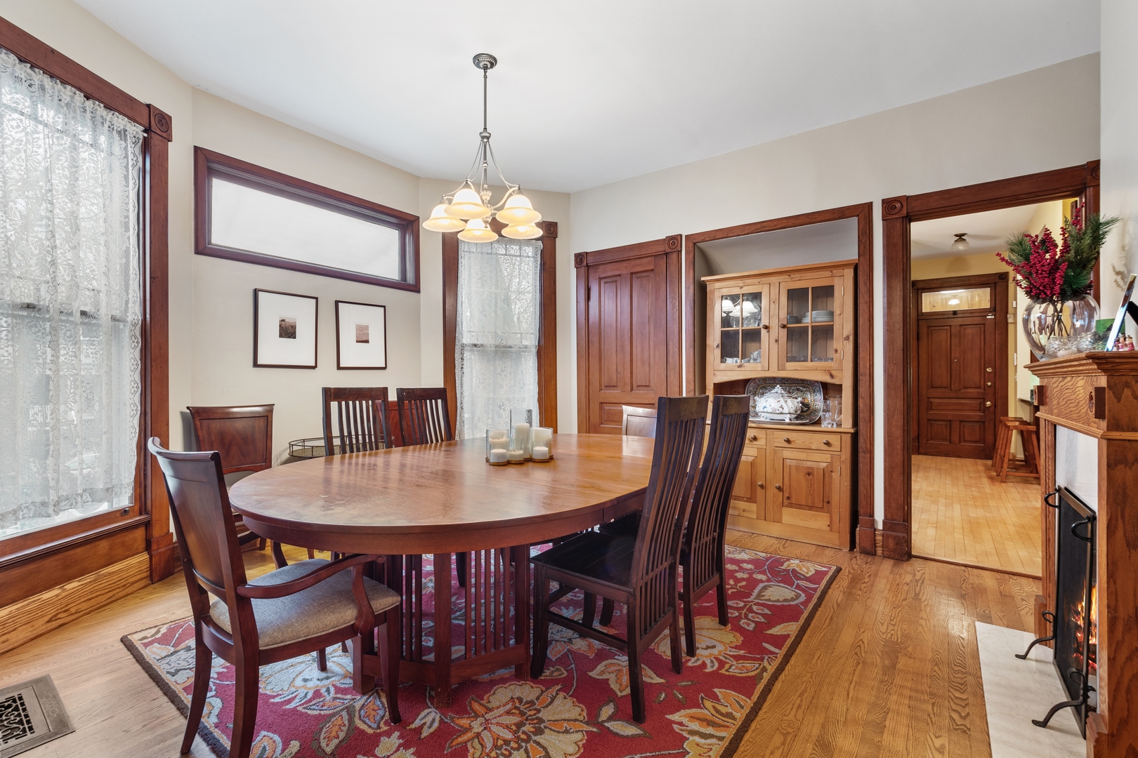 1333 Church Street Evanston, IL 60201 - Photo 11 of 32 a view of a dining room with furniture wooden floor and chandelier