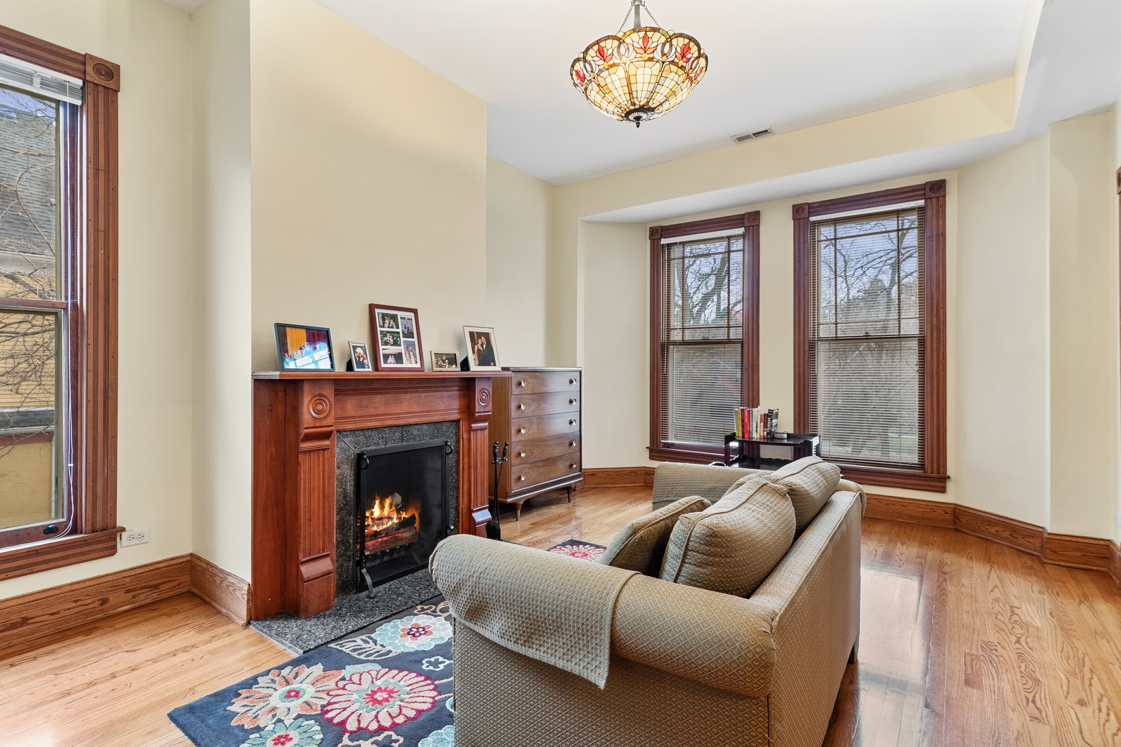 1333 Church Street Evanston, IL 60201 - Photo 19 of 32 a living room with furniture and a fireplace
