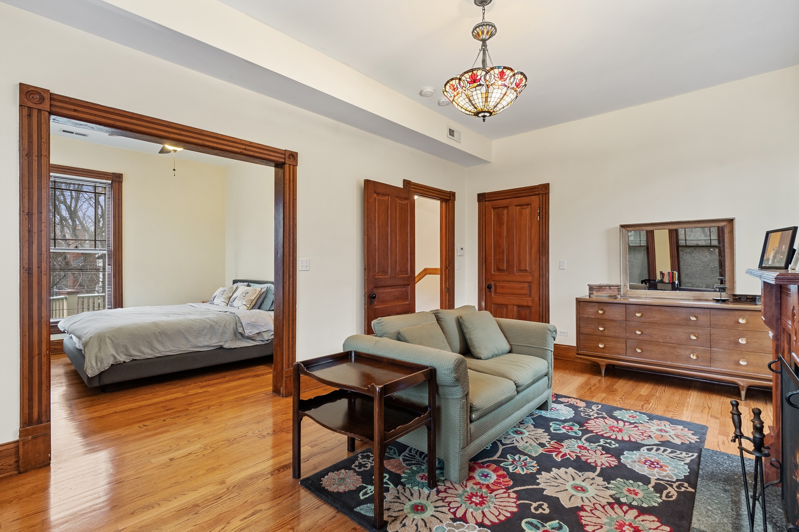 1333 Church Street Evanston, IL 60201 - Photo 20 of 32 a living room with furniture and a wooden floor